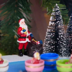 Villagio di Natale con Paesaggio Innevato Luna Park con Tazze rotanti in movimento, h 20 cm, musiche natalizie